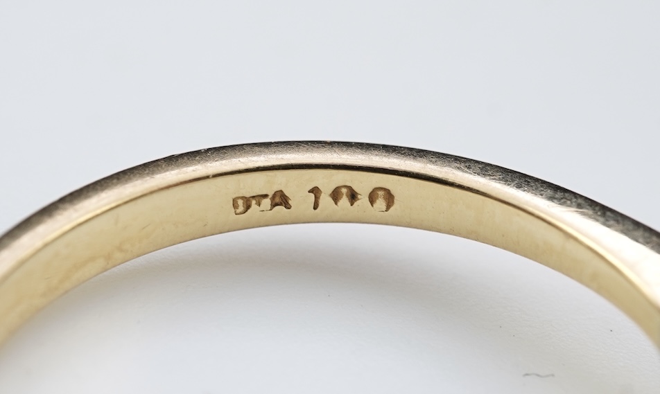 A diamond solitaire ring
